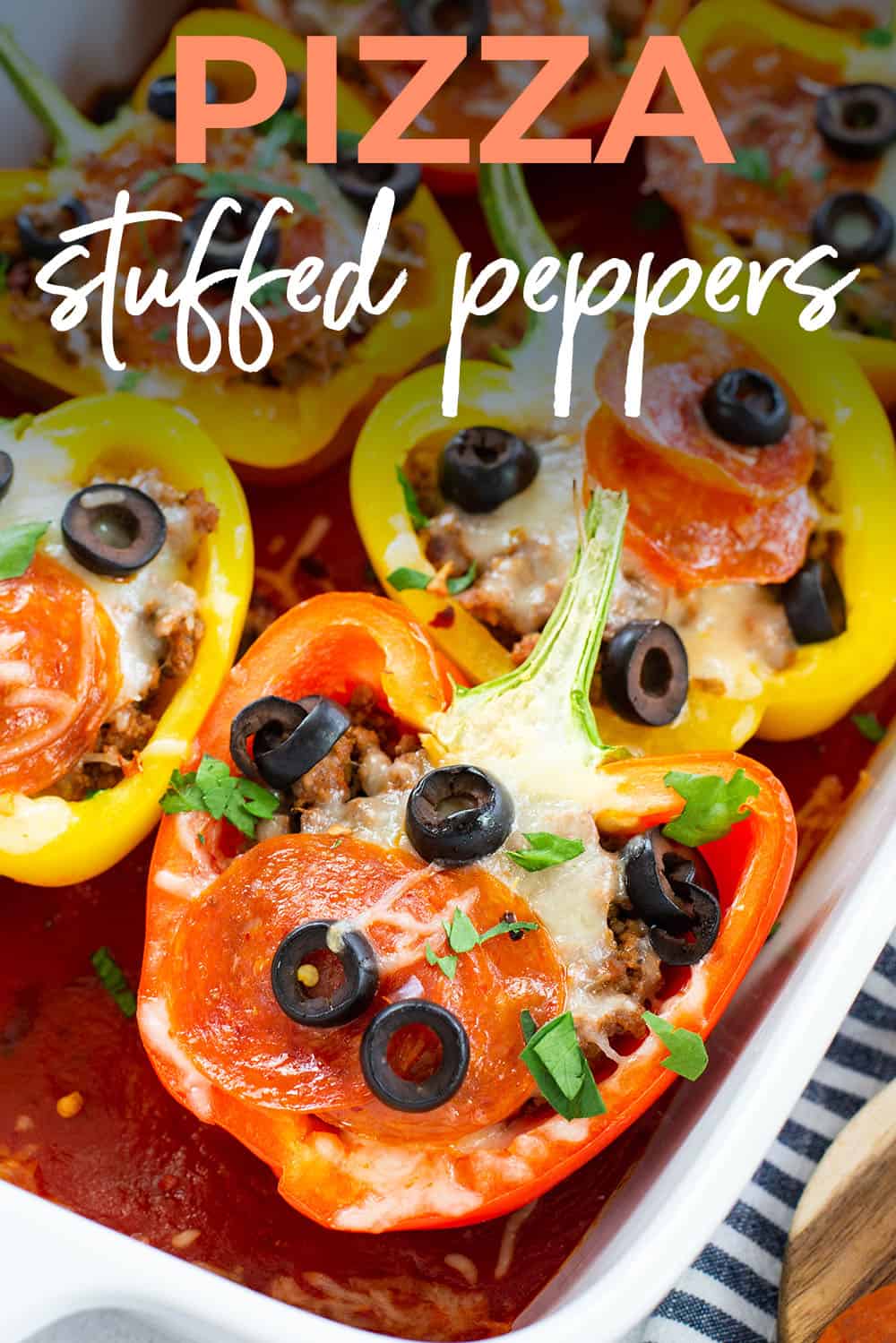 pizza stuffed peppers in baking dish with text for Pinterest.
