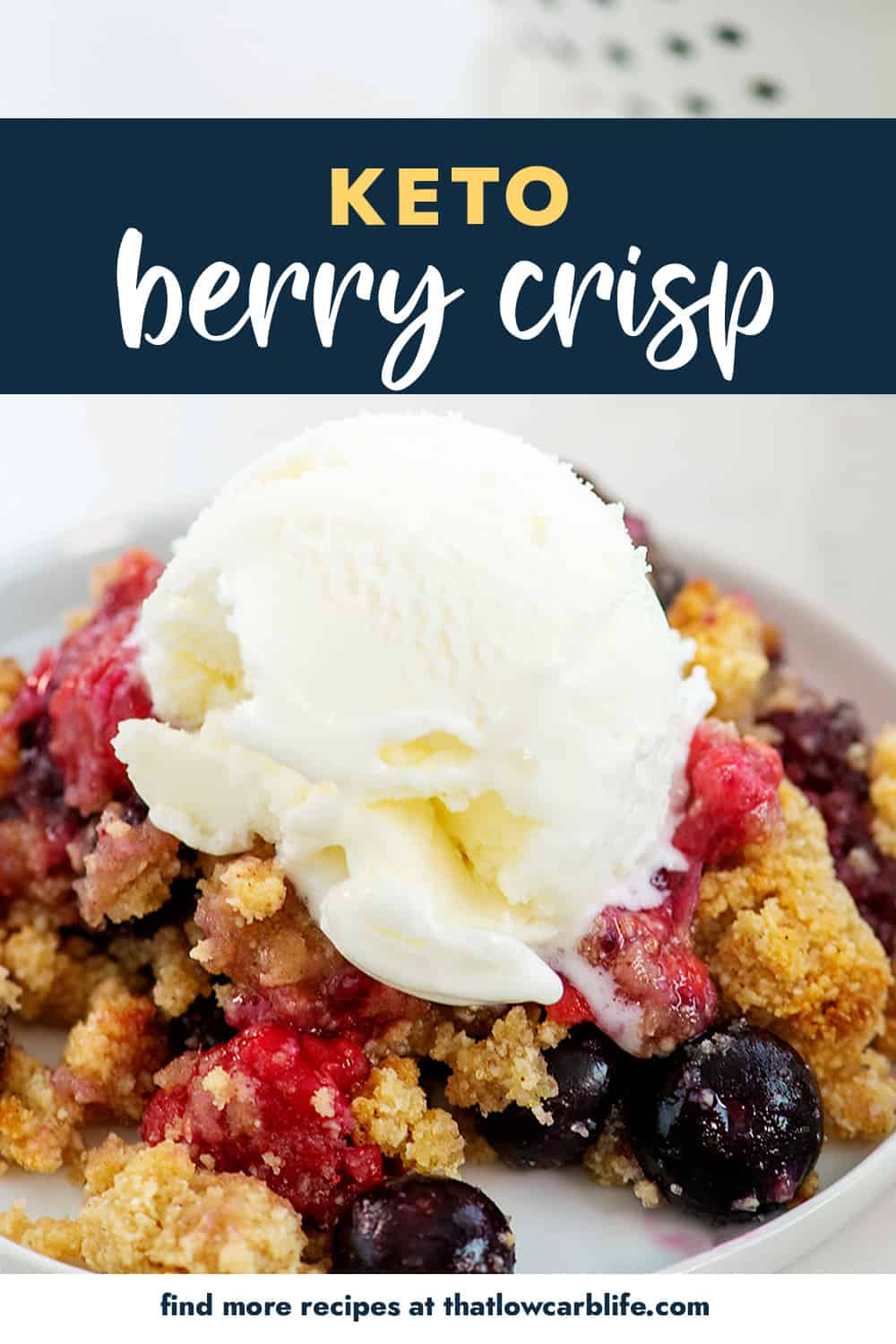 keto berry crisp with ice cream on top.