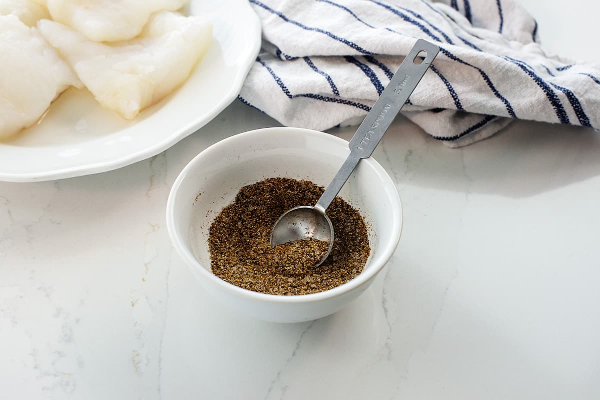 fish taco seasoning in small white bowl.