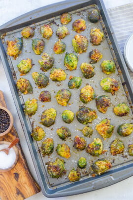 smashed Brussels sprouts on baking sheet.