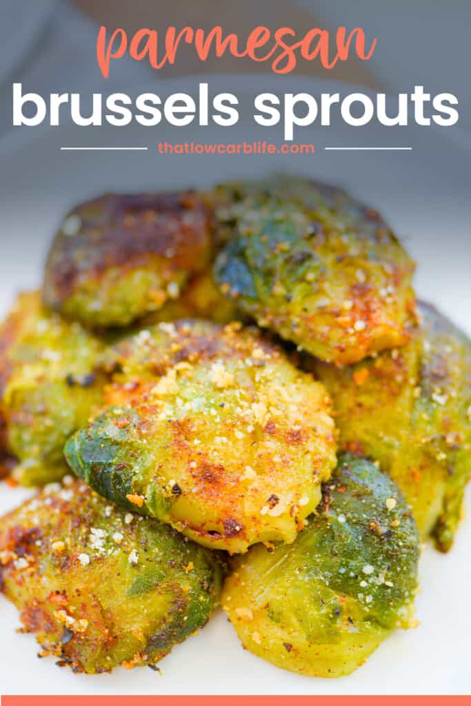 parmesan smashed brussel sprouts on white plate with text for pinterest.