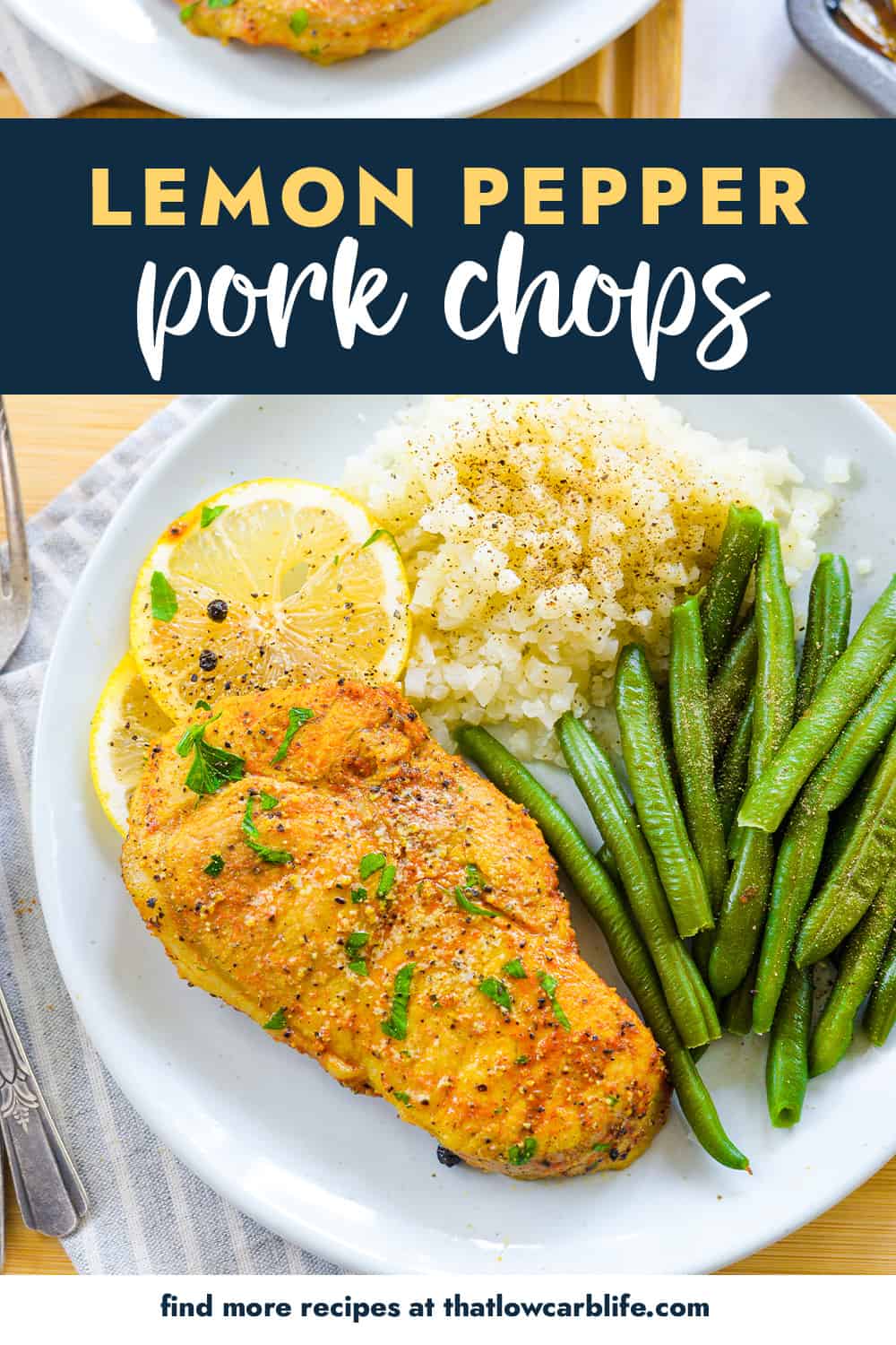 Plate topped with pork chop, green beans, and cauliflower rice.