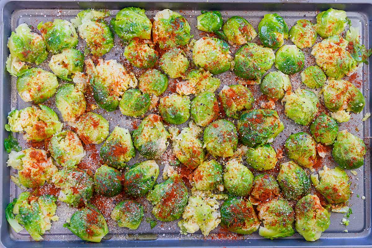 seasoned brussels sprouts on baking sheet.