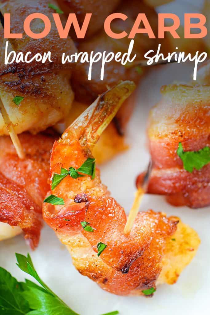 Bacon wrapped shrimp on plate.