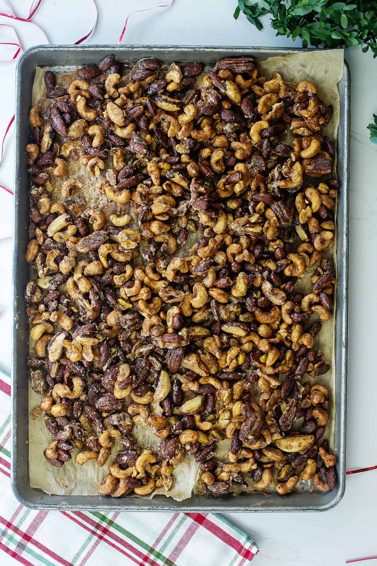 Candied nuts on bakign sheet.