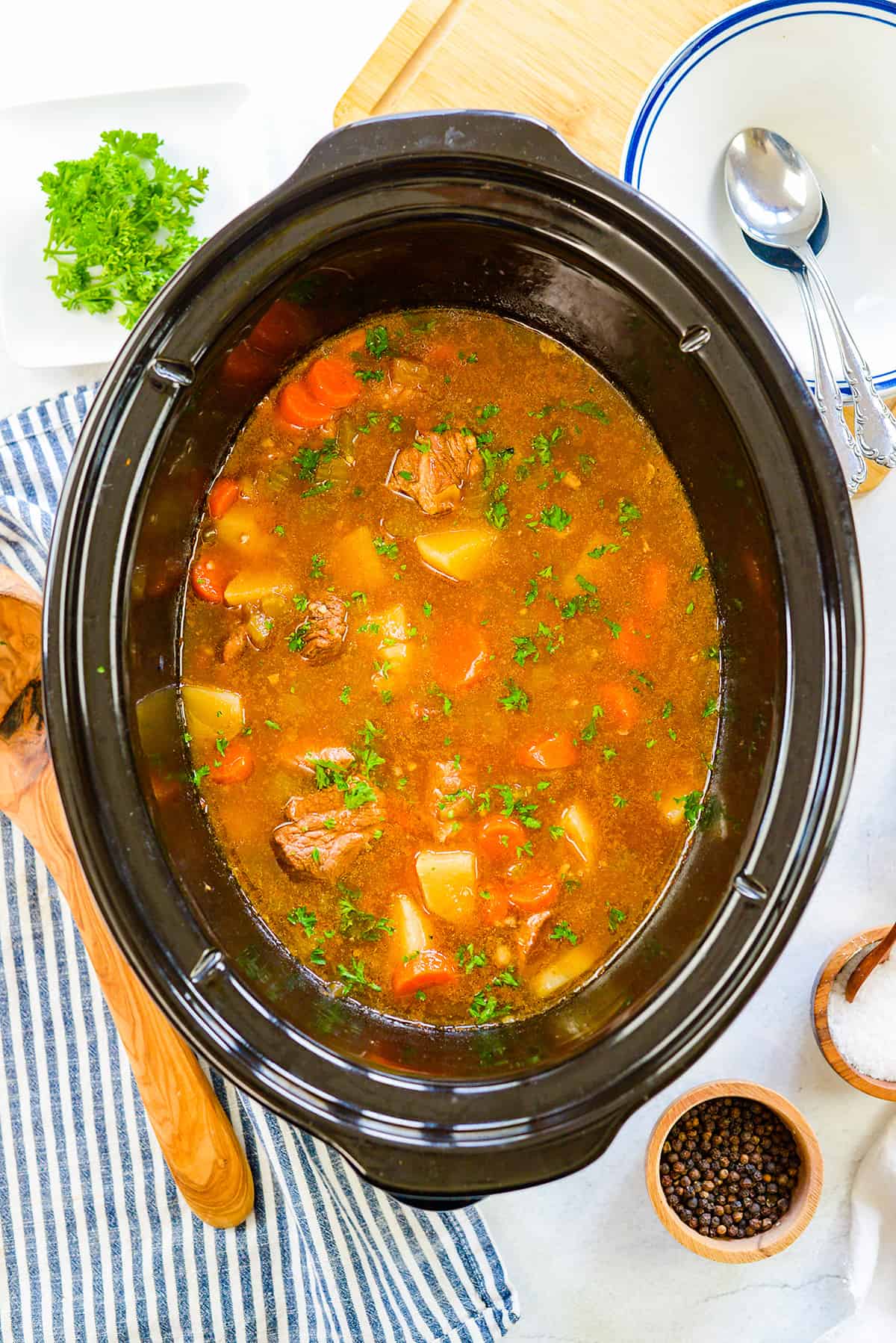 Overhead view of beef stew in crockpot.