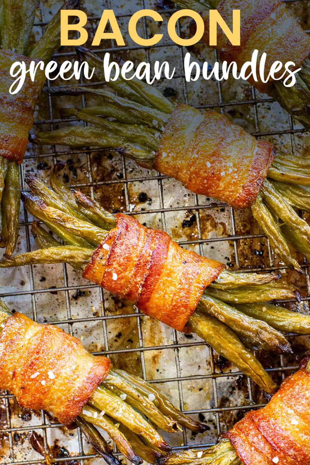 Bacon wrapped green beans on cooling rack.