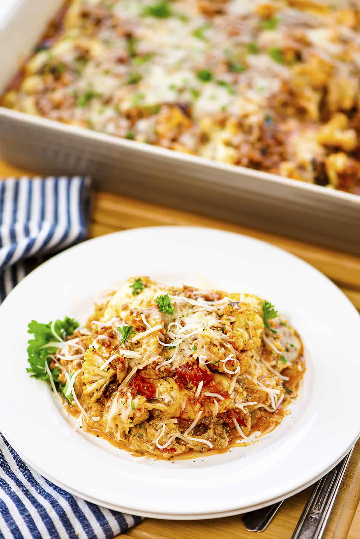 Cauliflower baked ziti on white plate.