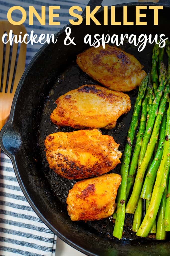 Chicken thighs and asparagus in skillet.