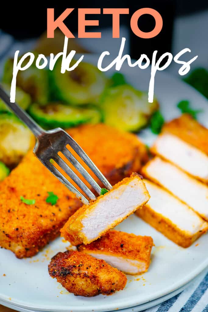 Sliced pork chop on fork.