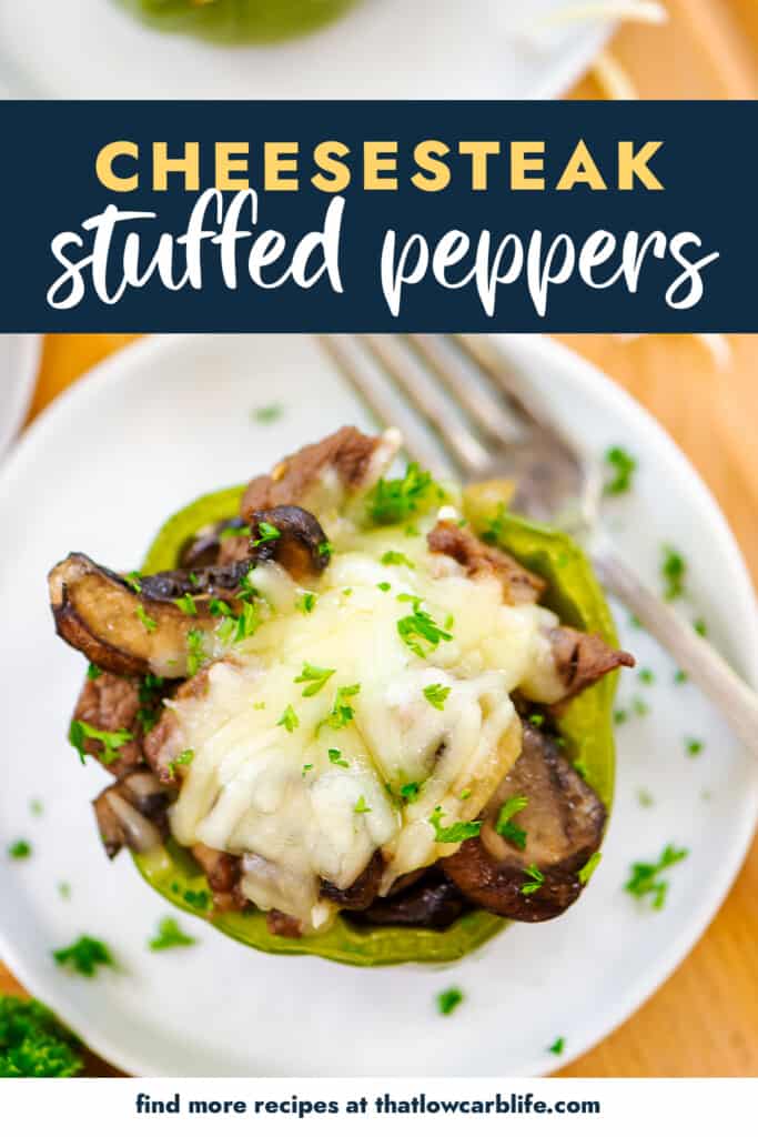 Stuffed pepper on white plate with text for Pinterest.