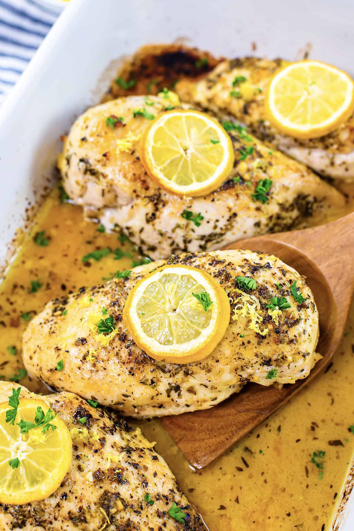 Lemon butter chicken in baking dish.