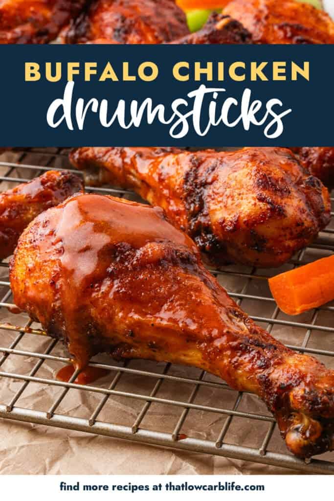 Buffalo chicken drumsticks on wire rack.