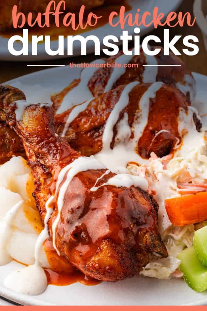 Buffalo chicken drumsticks drizzled with ranch dressing.