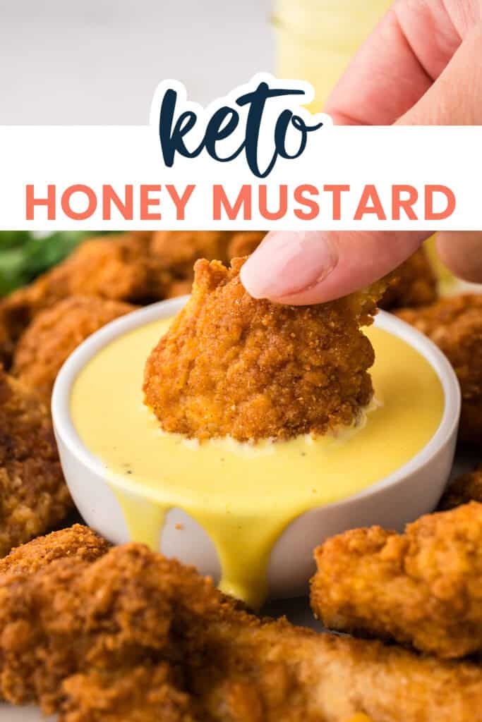 Low carb chicken nugget being dunked in keto honey mustard.