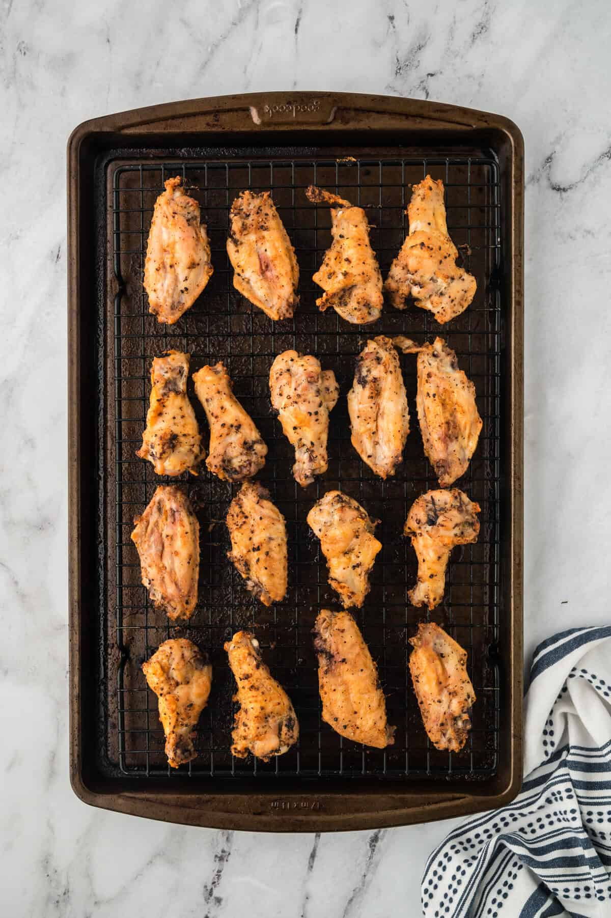 Baked wings on sheet pan.