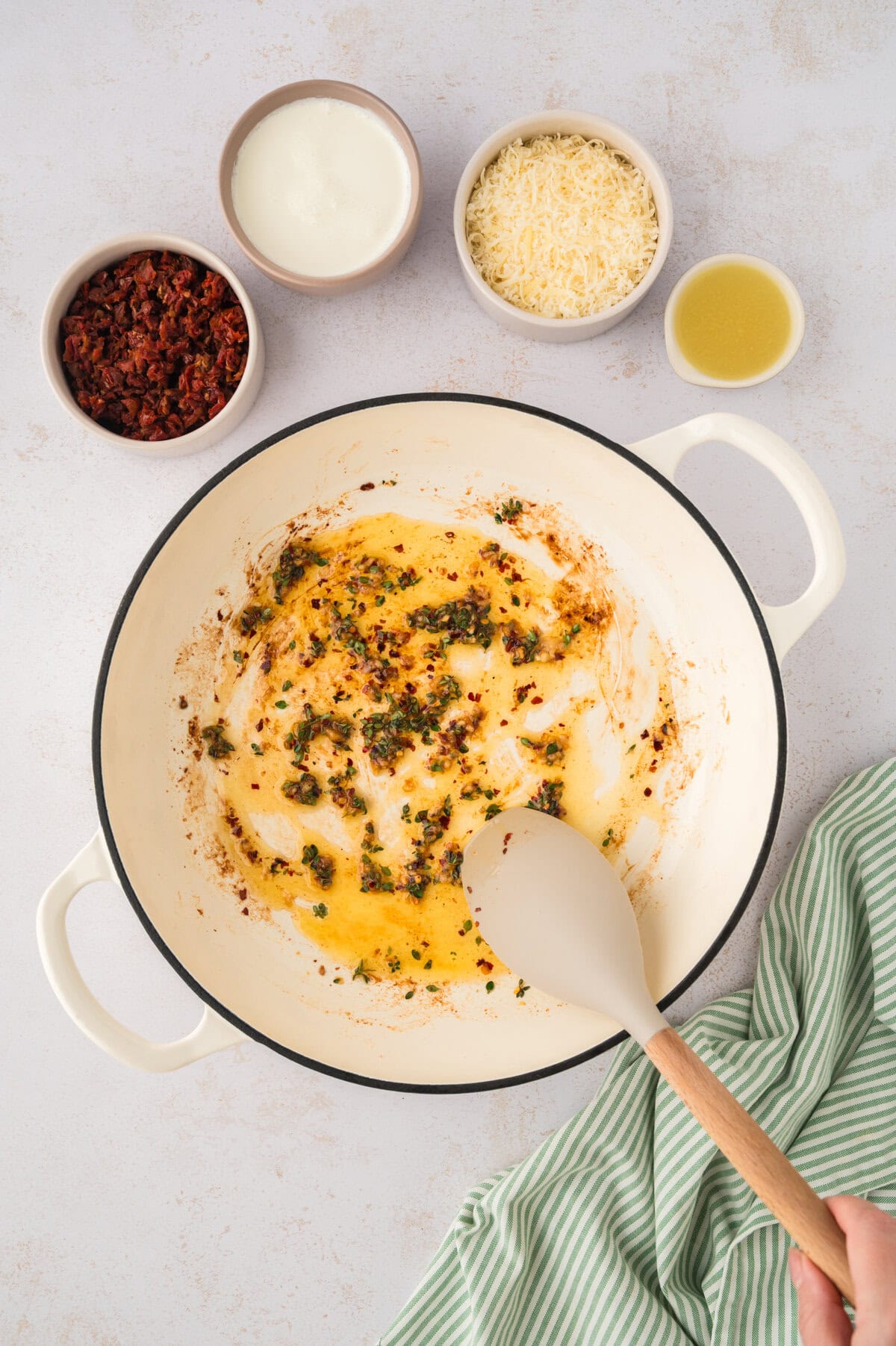 Garlic and red pepper flakes in butter.