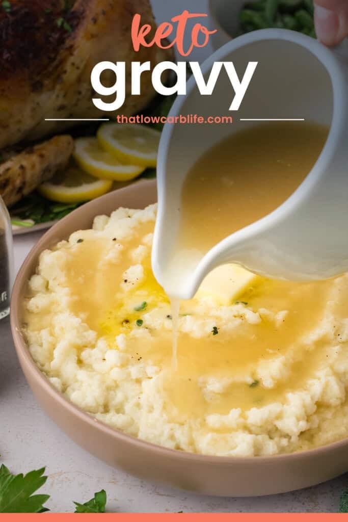 Keto gravy recipe being poured over mashed cauliflower.