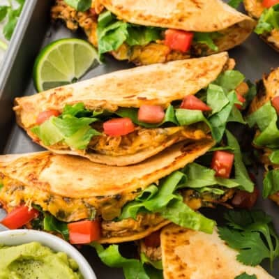 Keto chicken tacos on baking sheet.