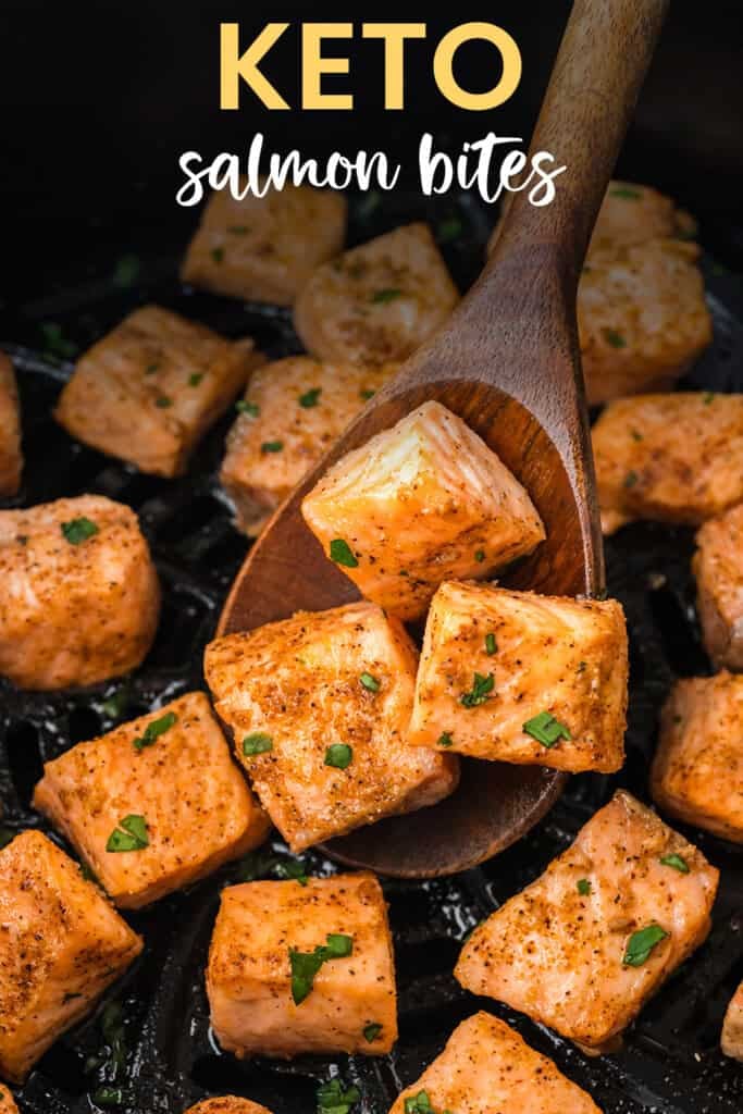 Keto salmon bites on wooden spoon.