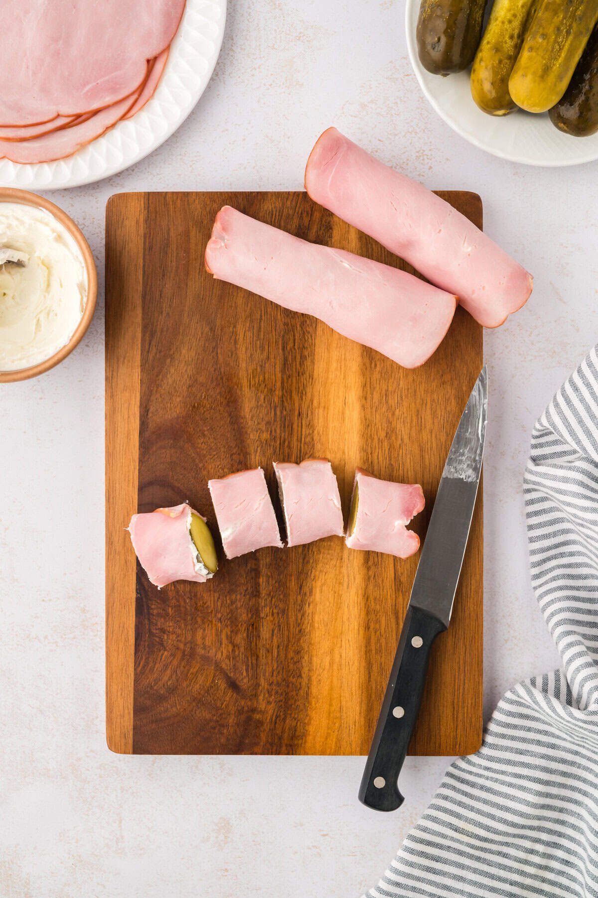 Sliced pickle roll ups.