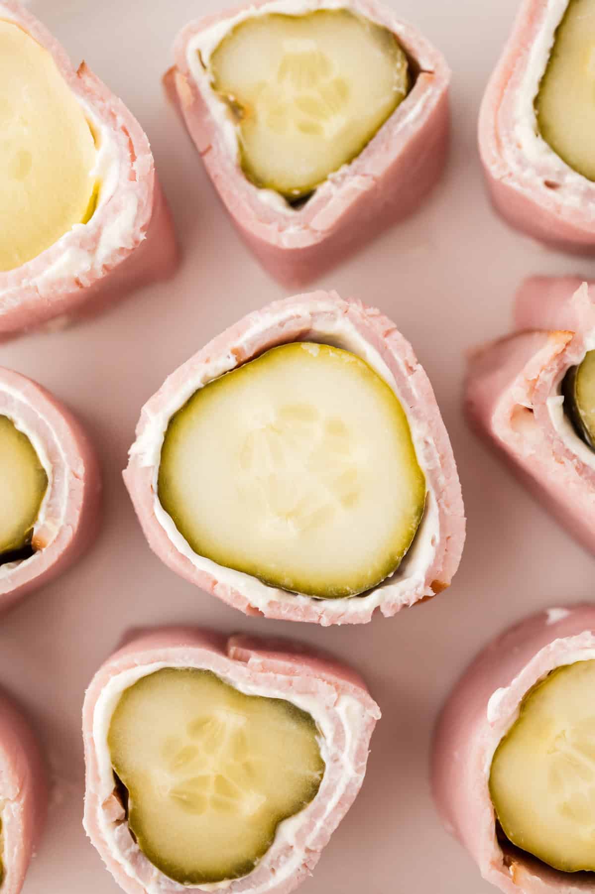 Ham and pickle roll up with cream cheese.