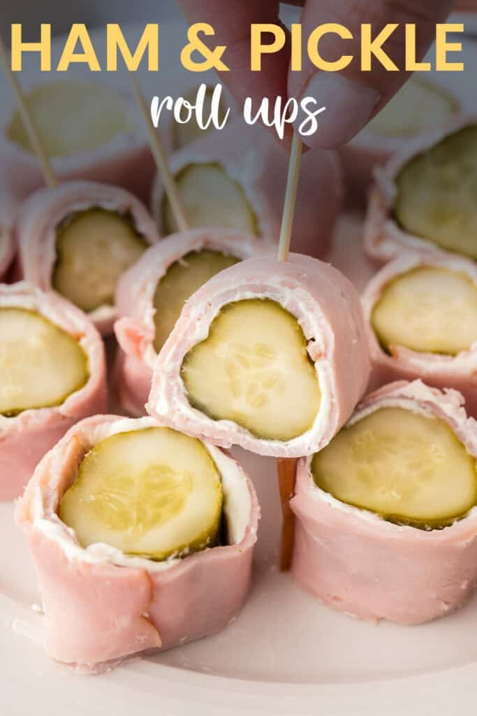Keto ham and pickles rolled up with cream cheese.