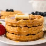 Keto waffles on white plate.