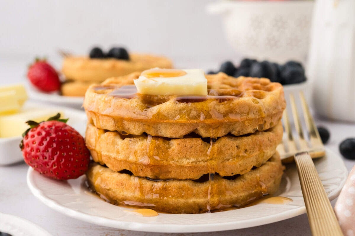 Keto waffles on white plate.