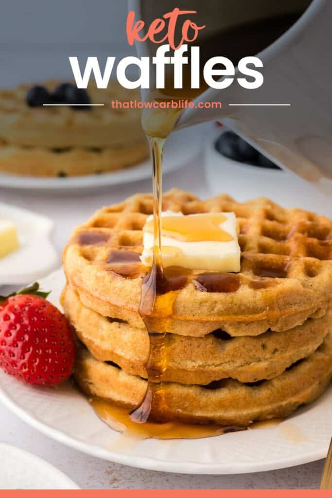 Keto waffles being drizzled with low carb syrup.