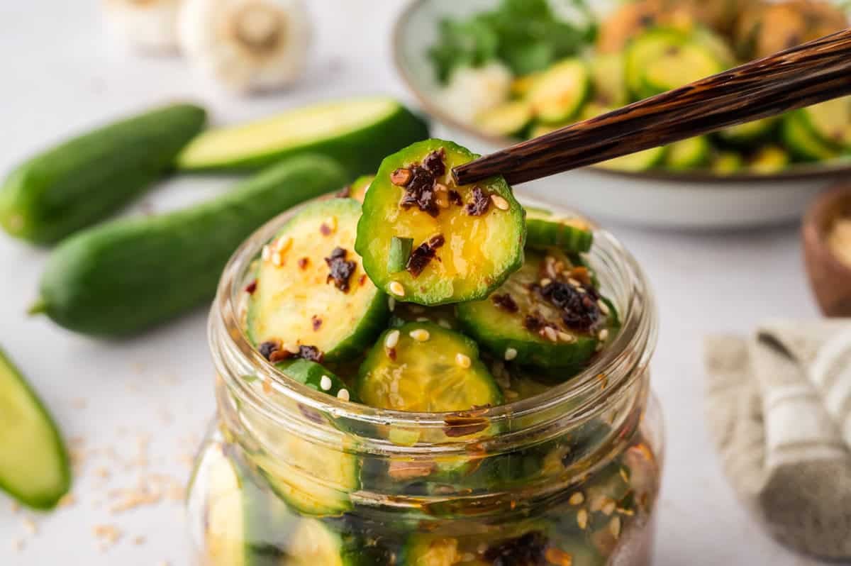 Keto Asian cucumber salad in small jar.