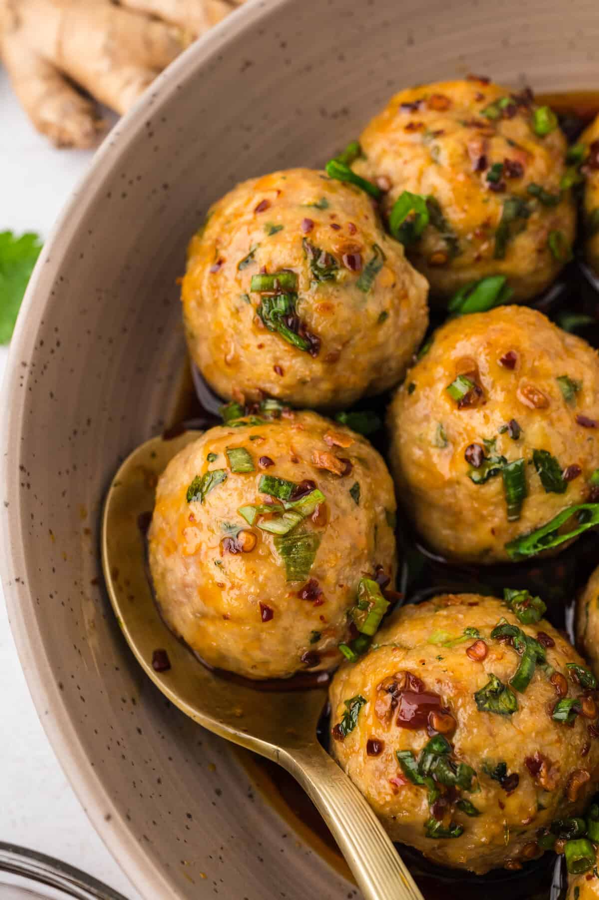 Dish full of low carb Asian turkey meatballs.