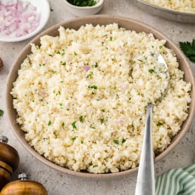 Bowl full of cauliflower rice pilaf recipe.