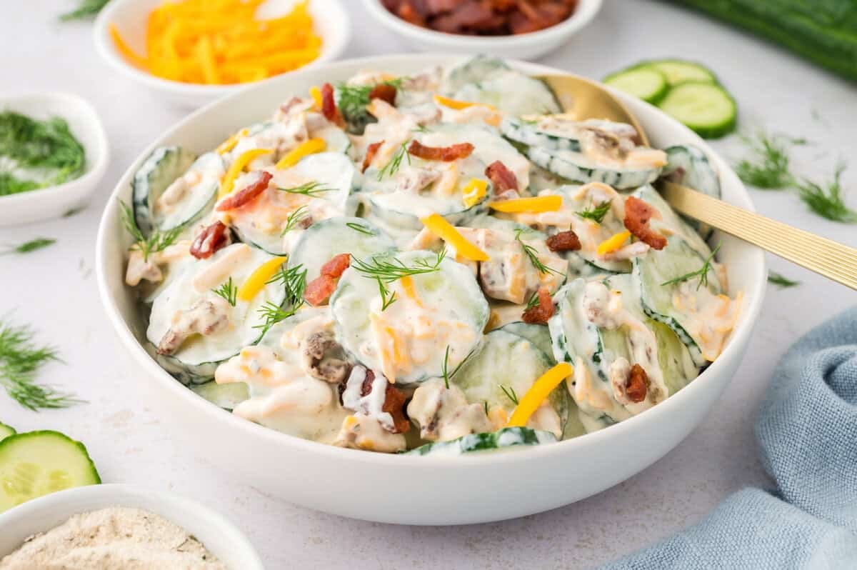White dish full of cucumber ranch crack salad.