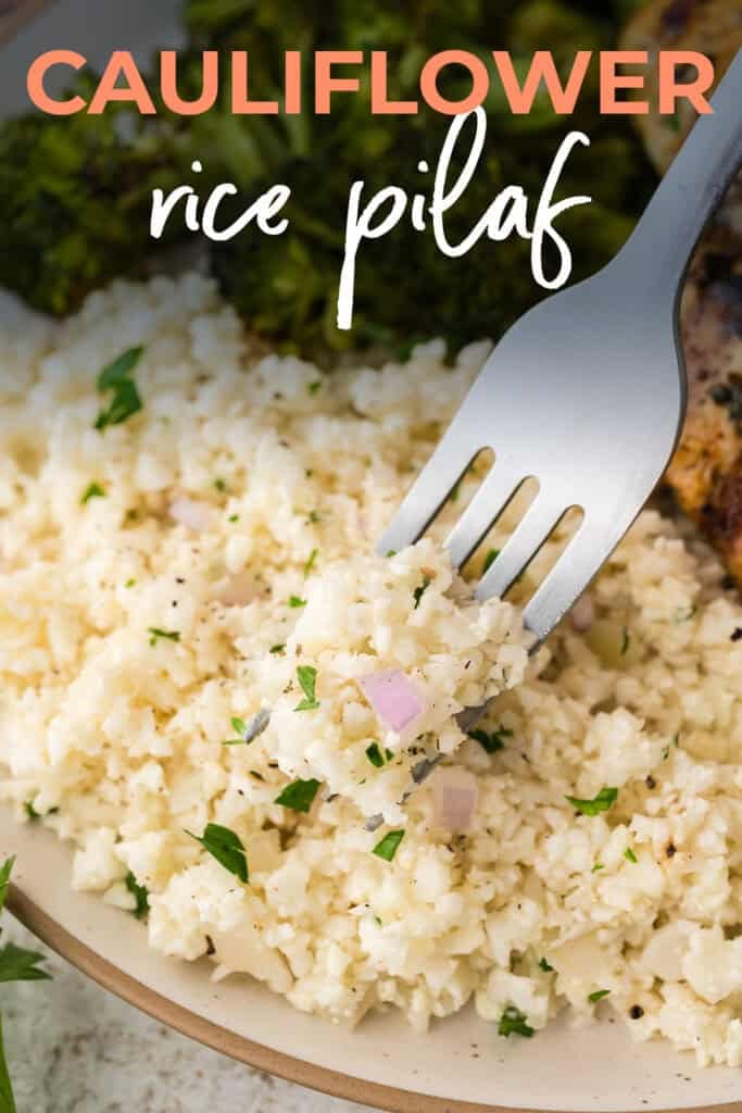 Close up of cauliflower rice pilaf on fork.