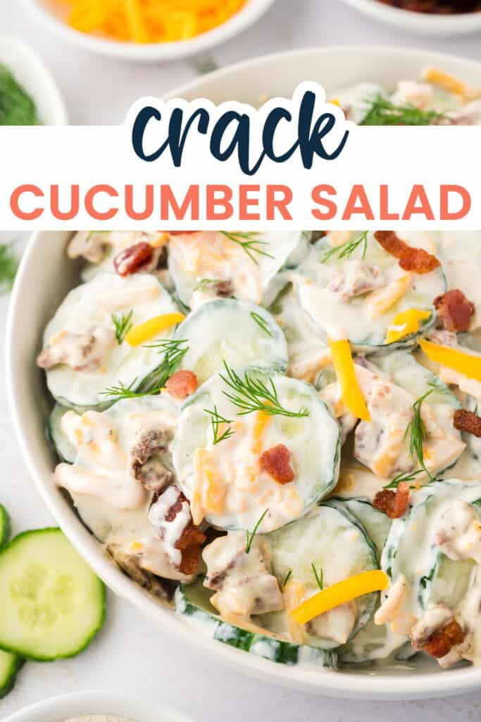 Crack cucumber salad in white bowl.