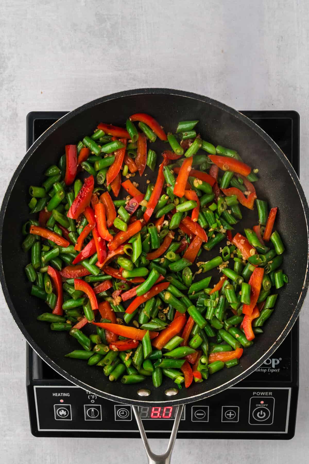 Vegetables in a skillet.