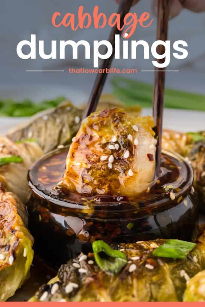 Cabbage dumpling being dipped in keto dumpling sauce.