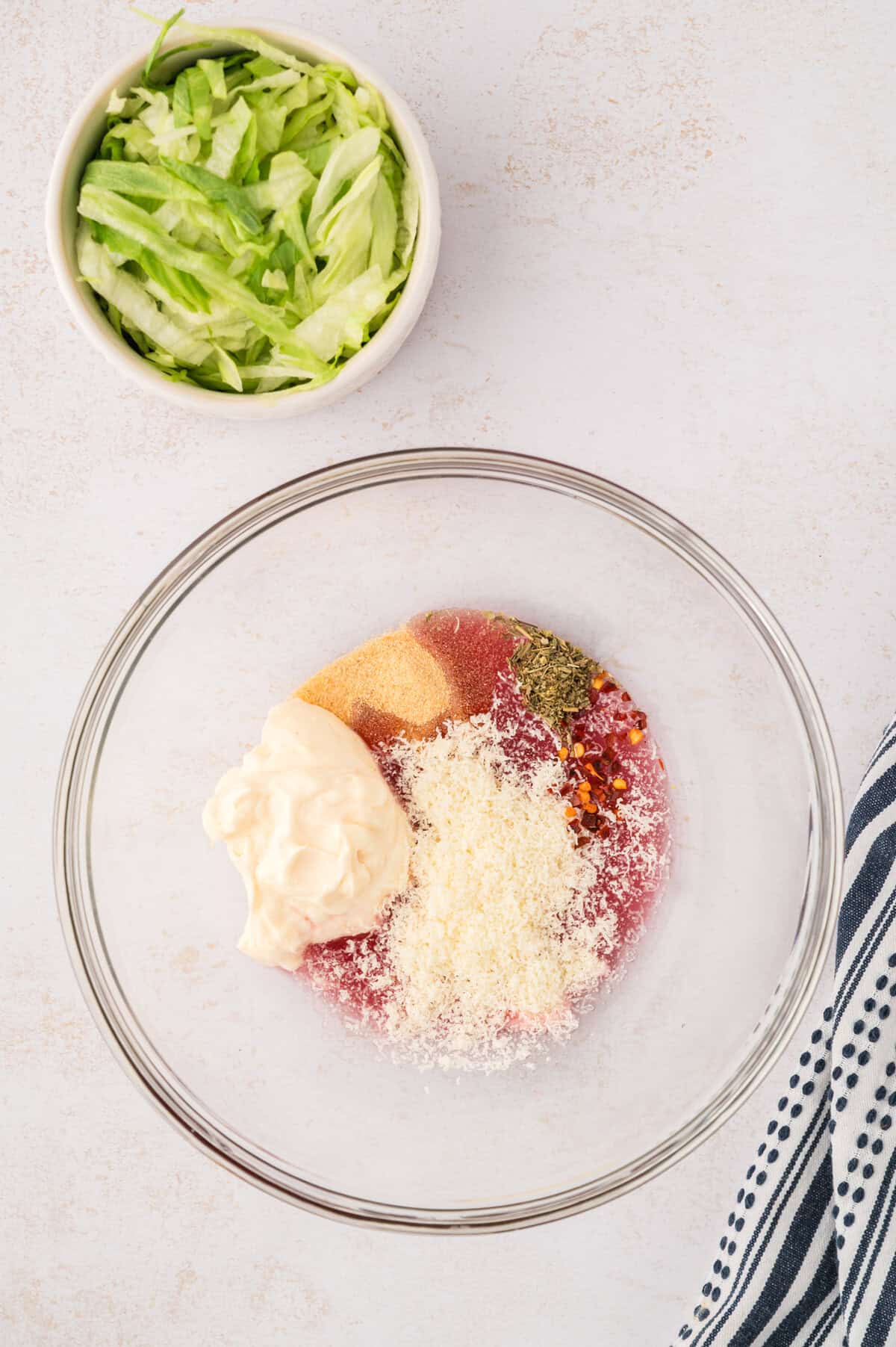 Dressing for salad in bowl.