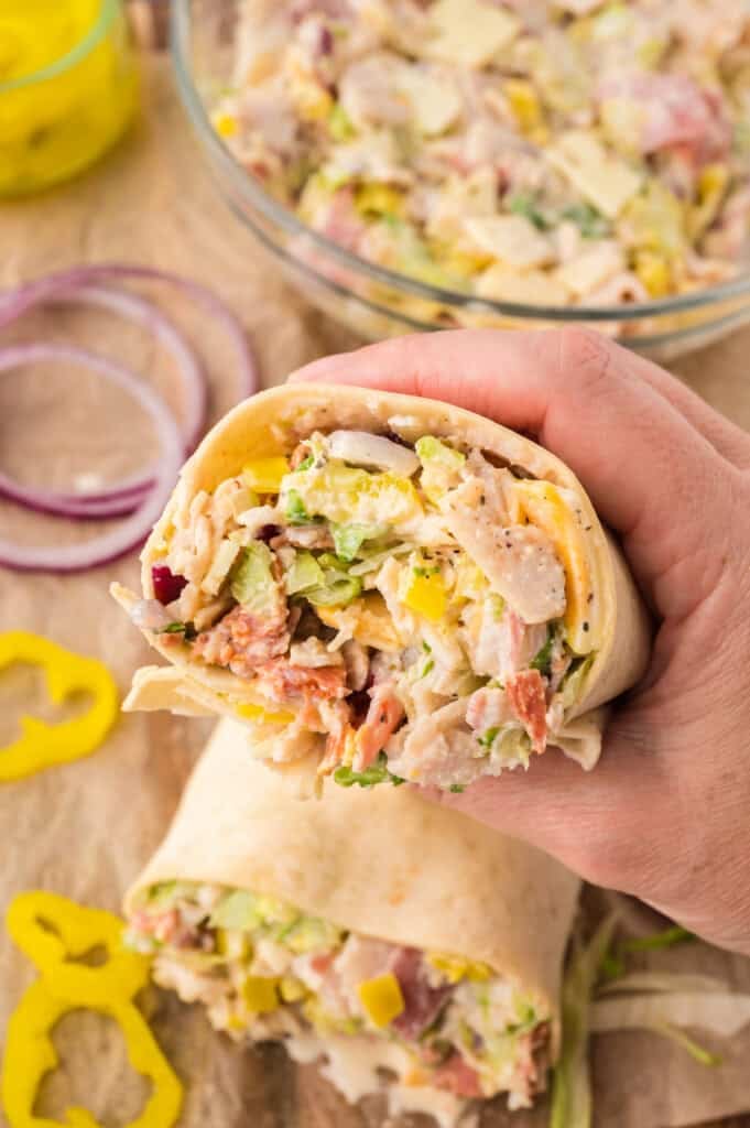 Hand holding a keto grinder wrap.
