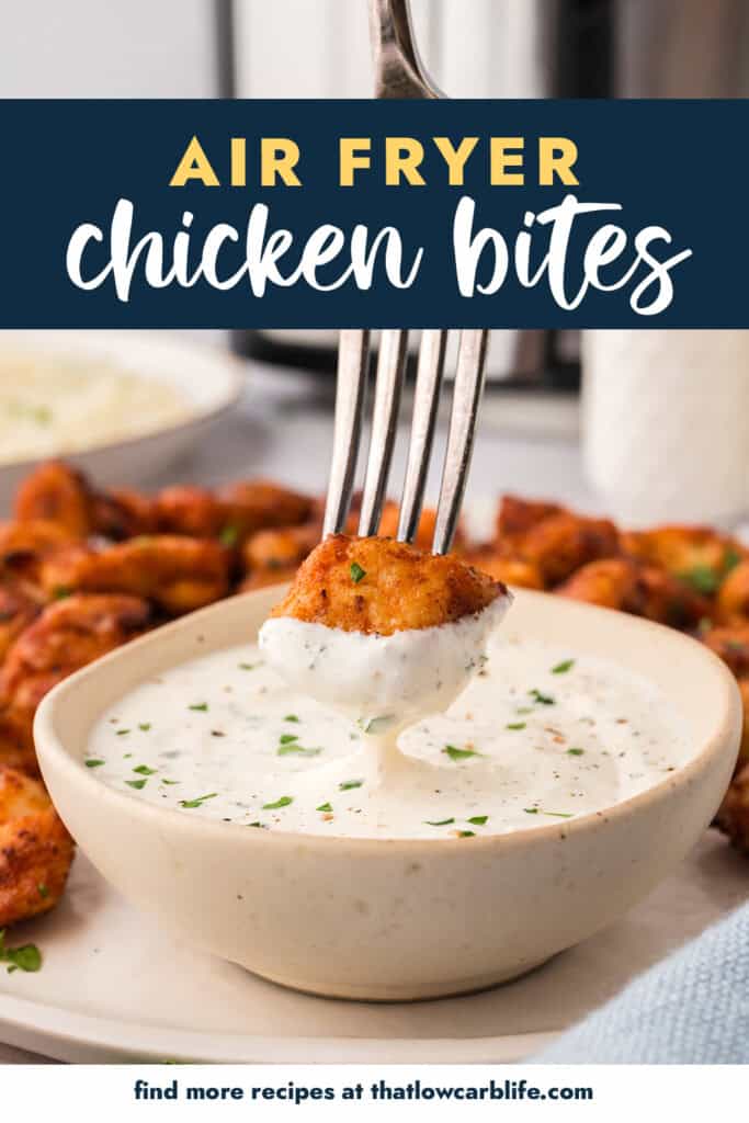 Fork dipping a chicken bite in ranch.