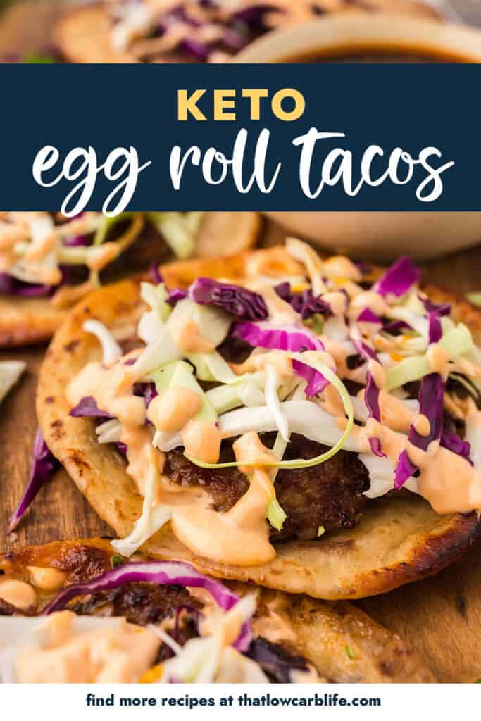 Keto egg roll tacos on wooden board.