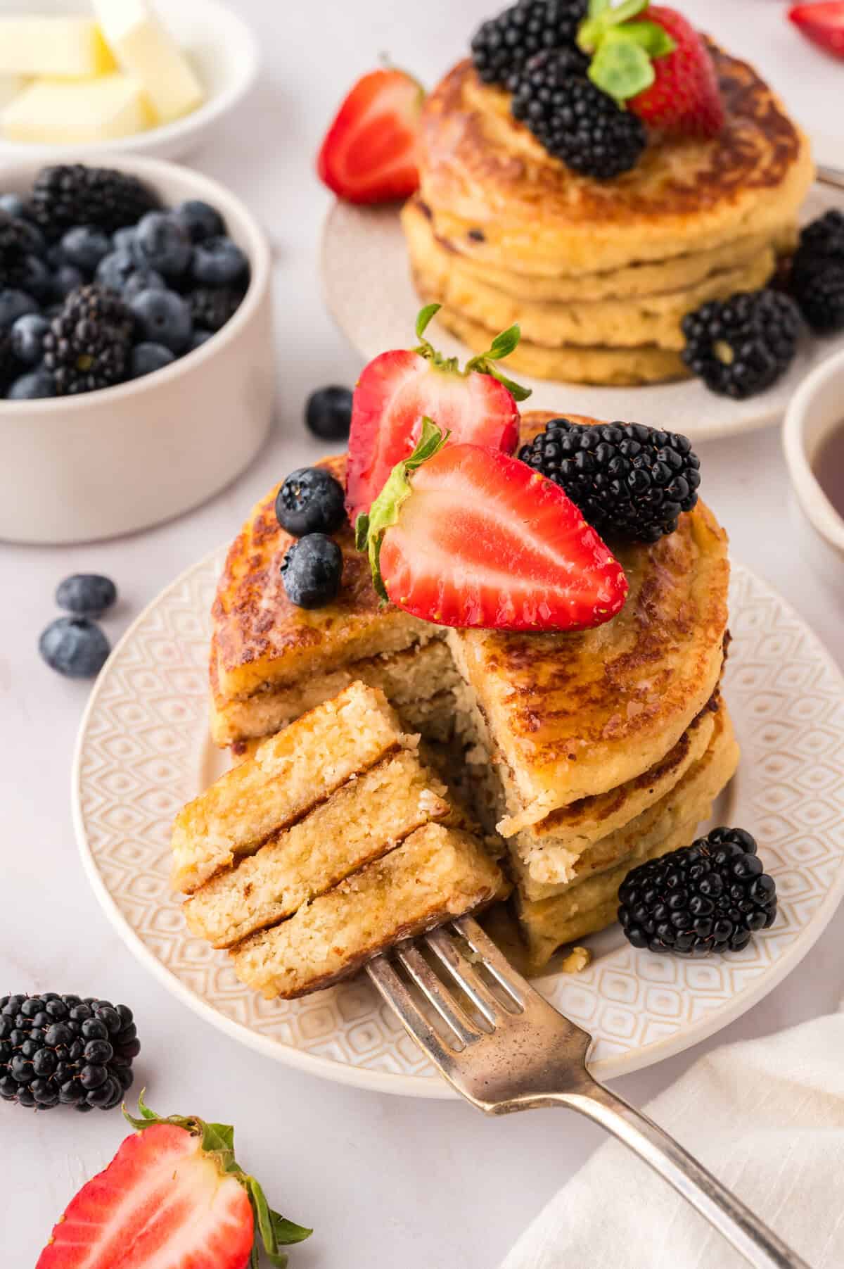 Stack of keto pancakes cut with a fork.