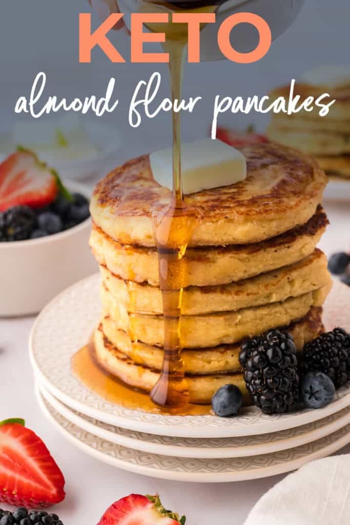 Stacked low carb pancakes drizzled with syrup.